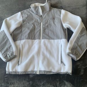 white and grey fuzz north face jacket